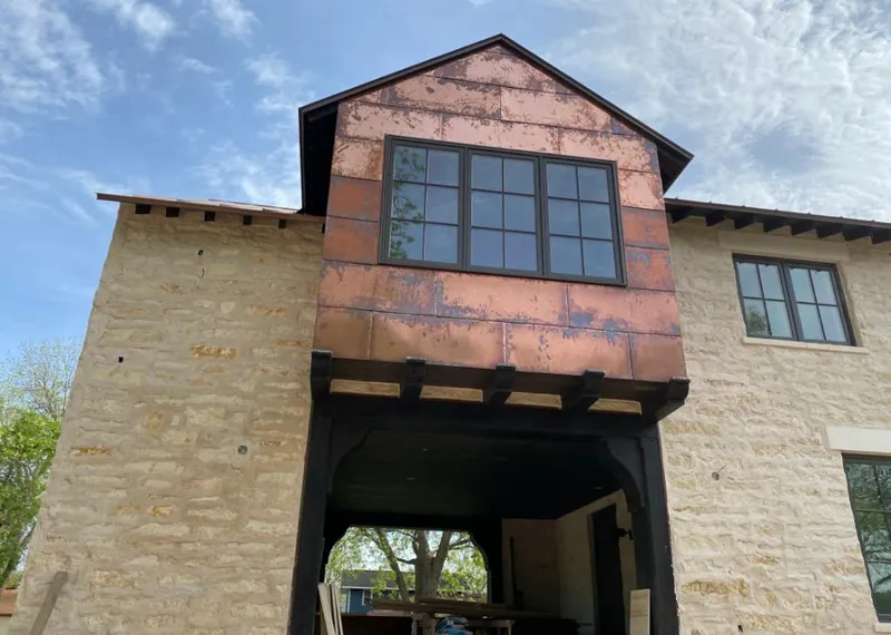 Copper metal panel facade on a stone building for Metal Roof Coating in Mount Vernon